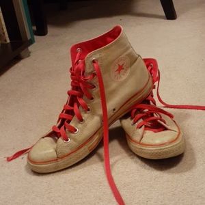White & neon pink converse high tops